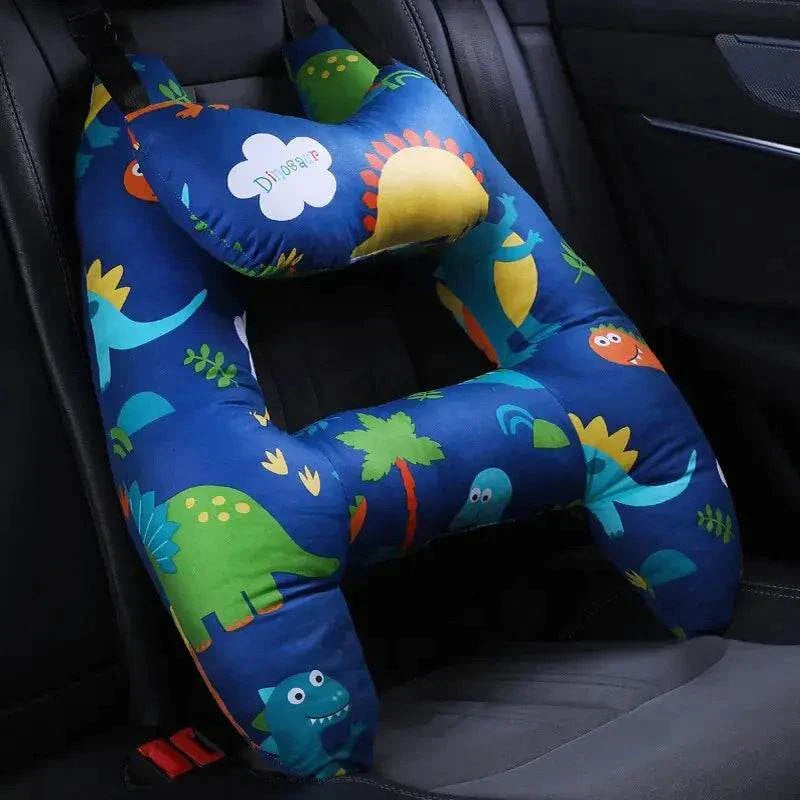 Kids car travel pillow with colorful dinosaur pattern, ergonomic and comfortable for long journeys.