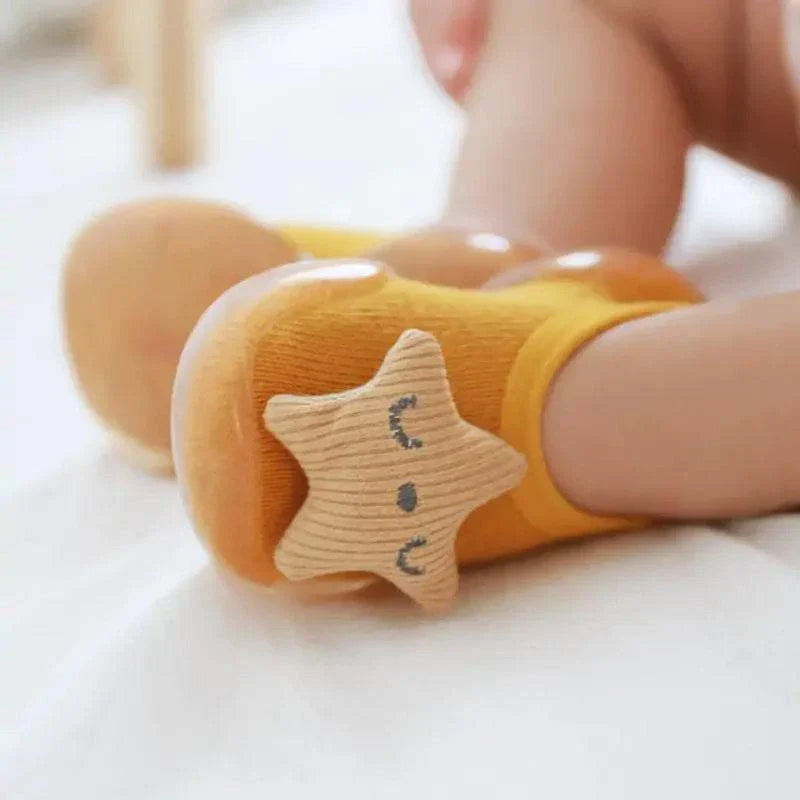 Toddler shoes with anti-slip soles and cozy built-in socks for warmth and safety.